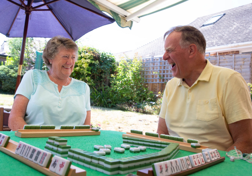 couple playing Mahjong